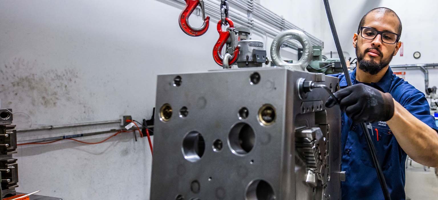 Shop worker with injection mold